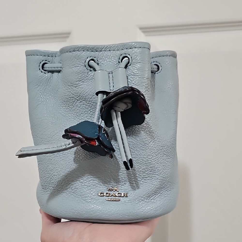 Coach Light Blue Mini Drawstring Bucket Bag with Floral Charm